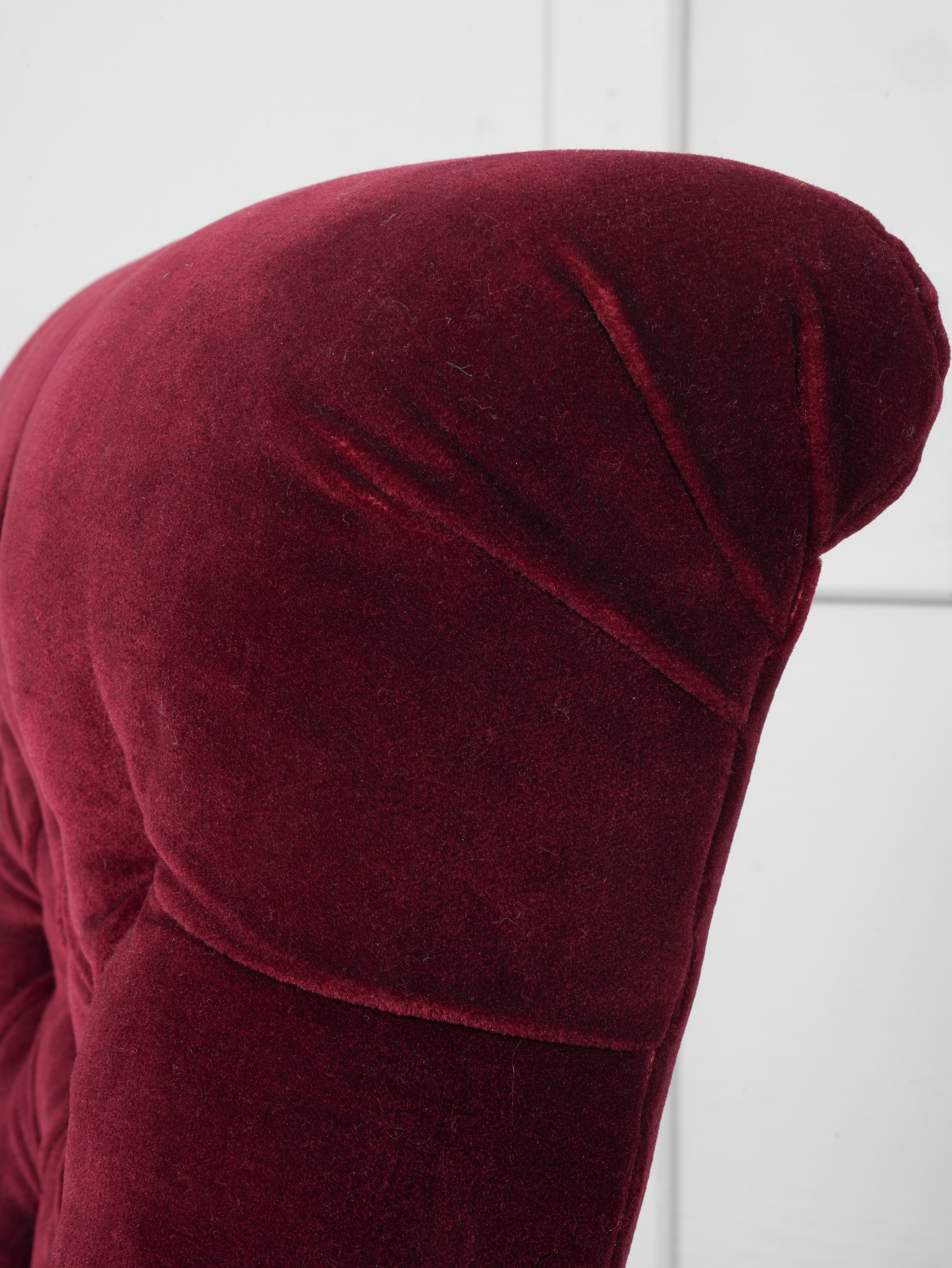 A Howard & Sons Buttoned Back Armchair