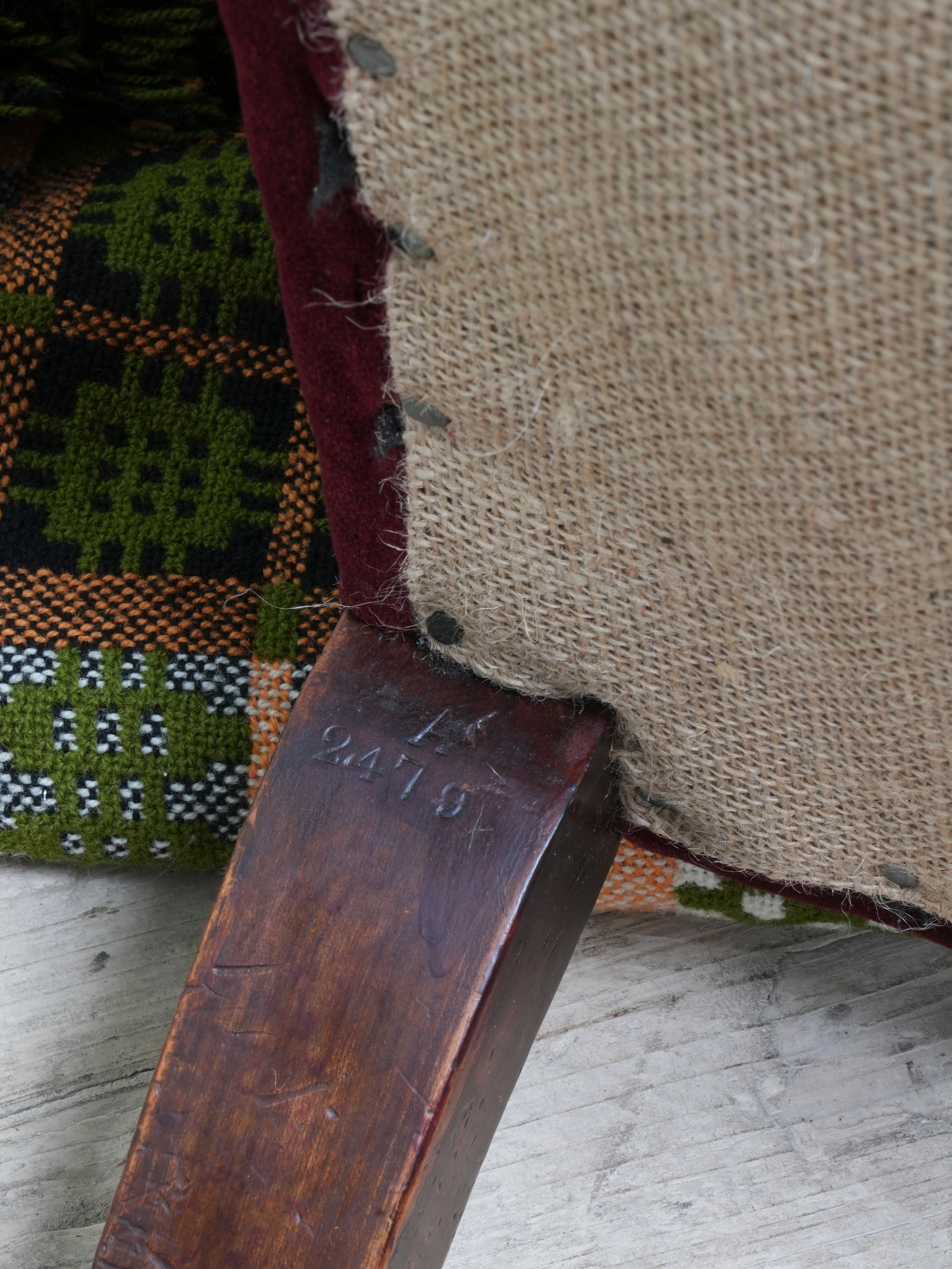 A Howard & Sons Buttoned Back Armchair