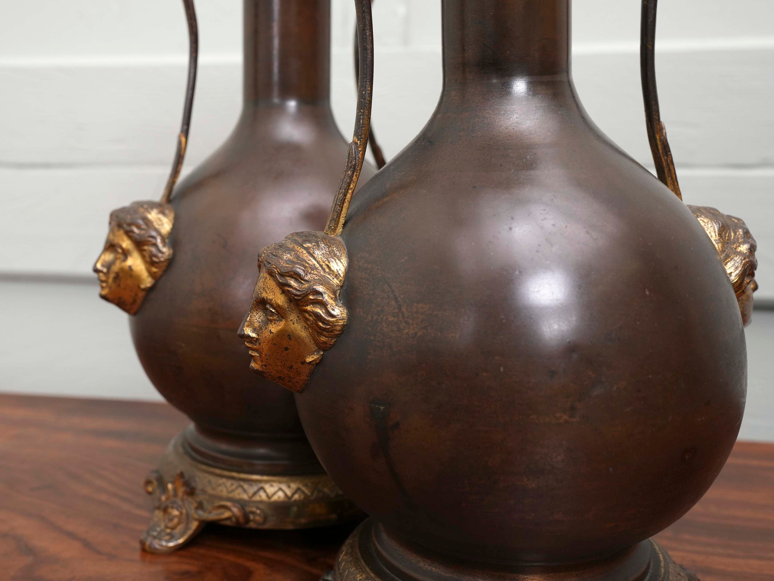 A Pair of Twin Handled Copper Vase Table Lamps