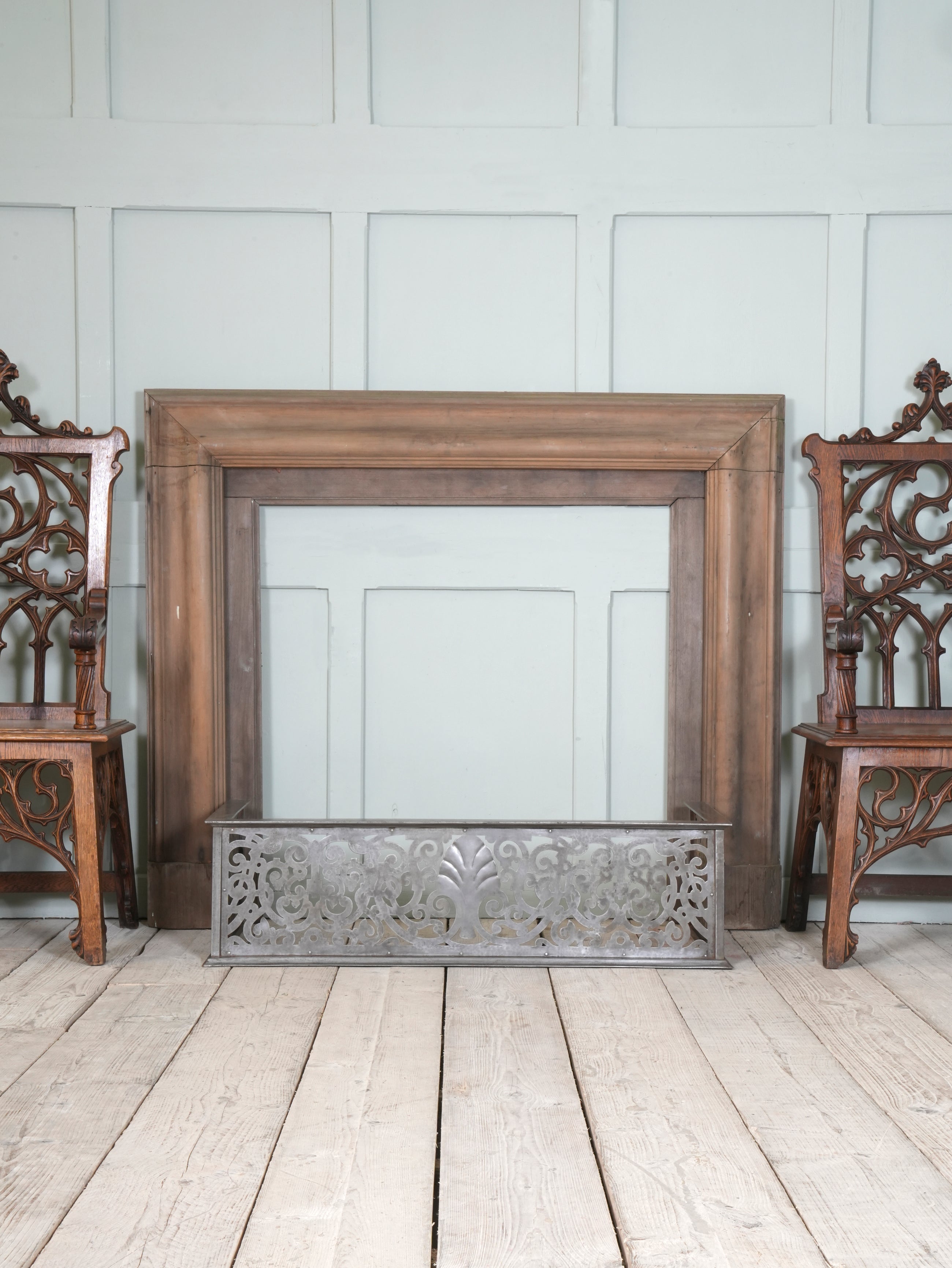 An Edwardian Pierced Steel Fireplace Fender