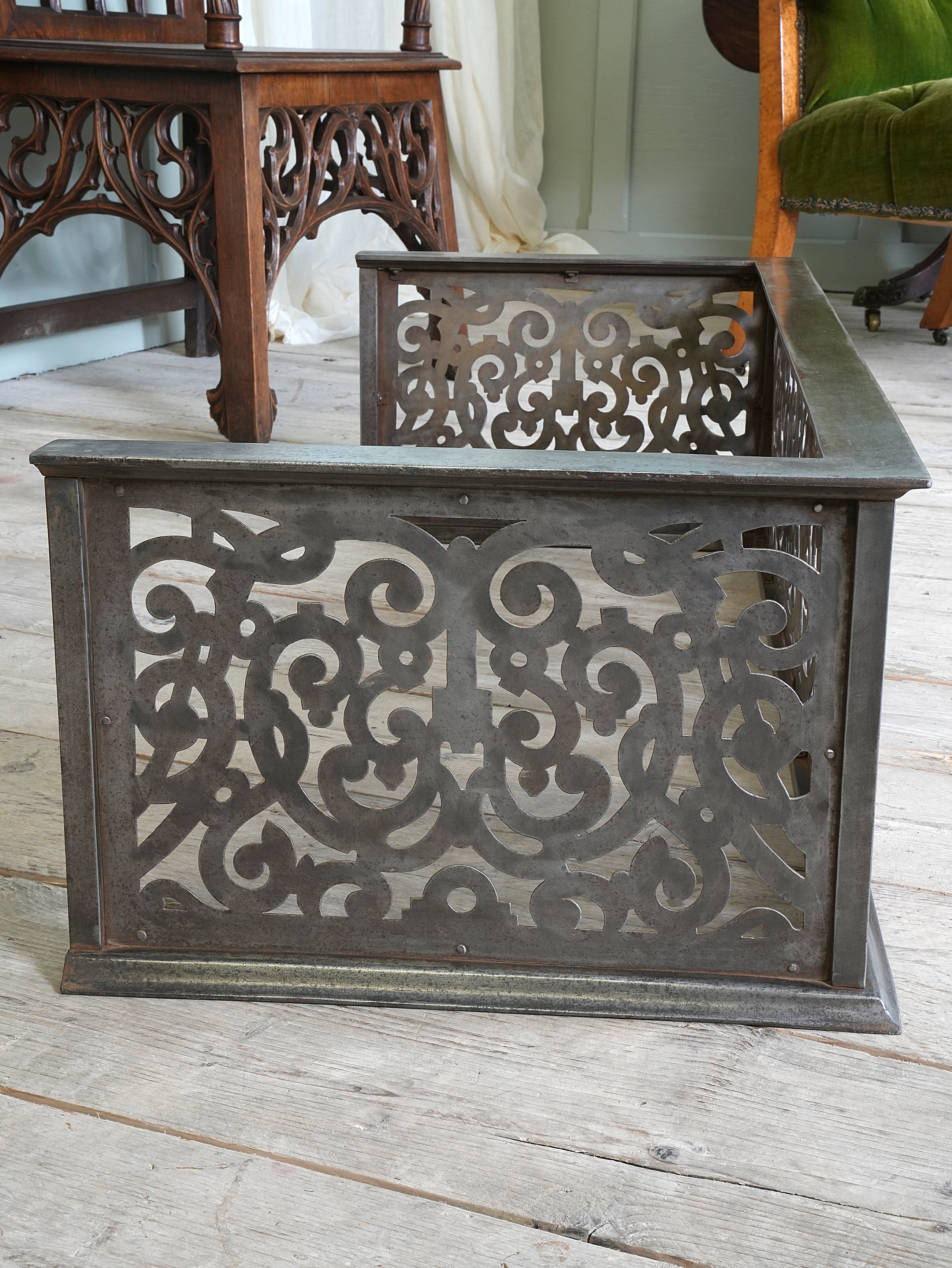 An Edwardian Pierced Steel Fireplace Fender
