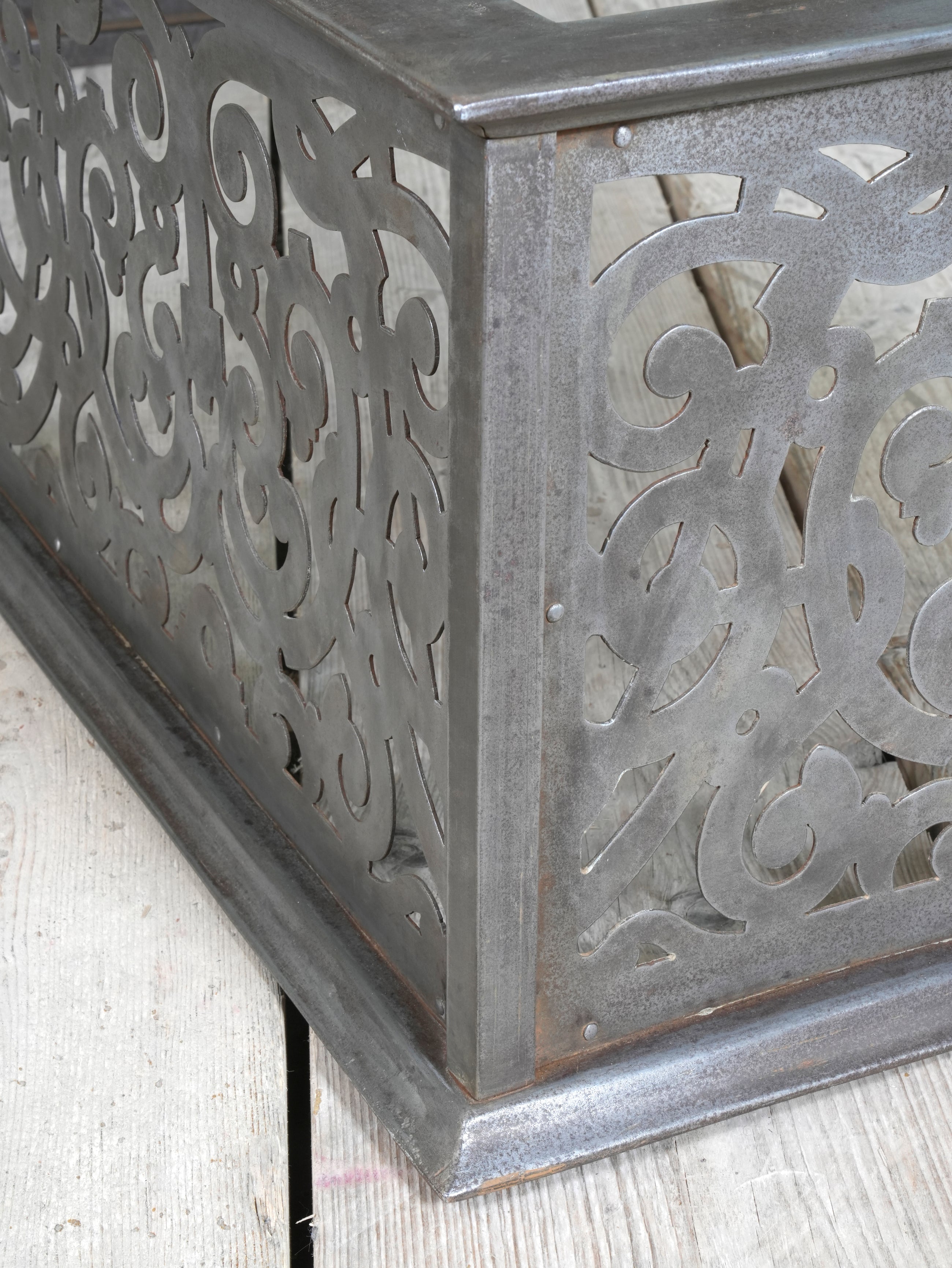 An Edwardian Pierced Steel Fireplace Fender