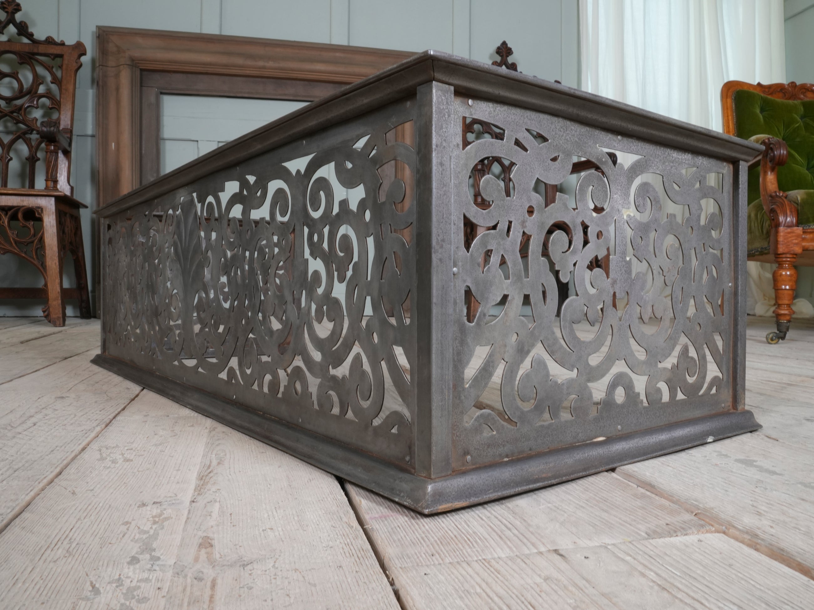 An Edwardian Pierced Steel Fireplace Fender