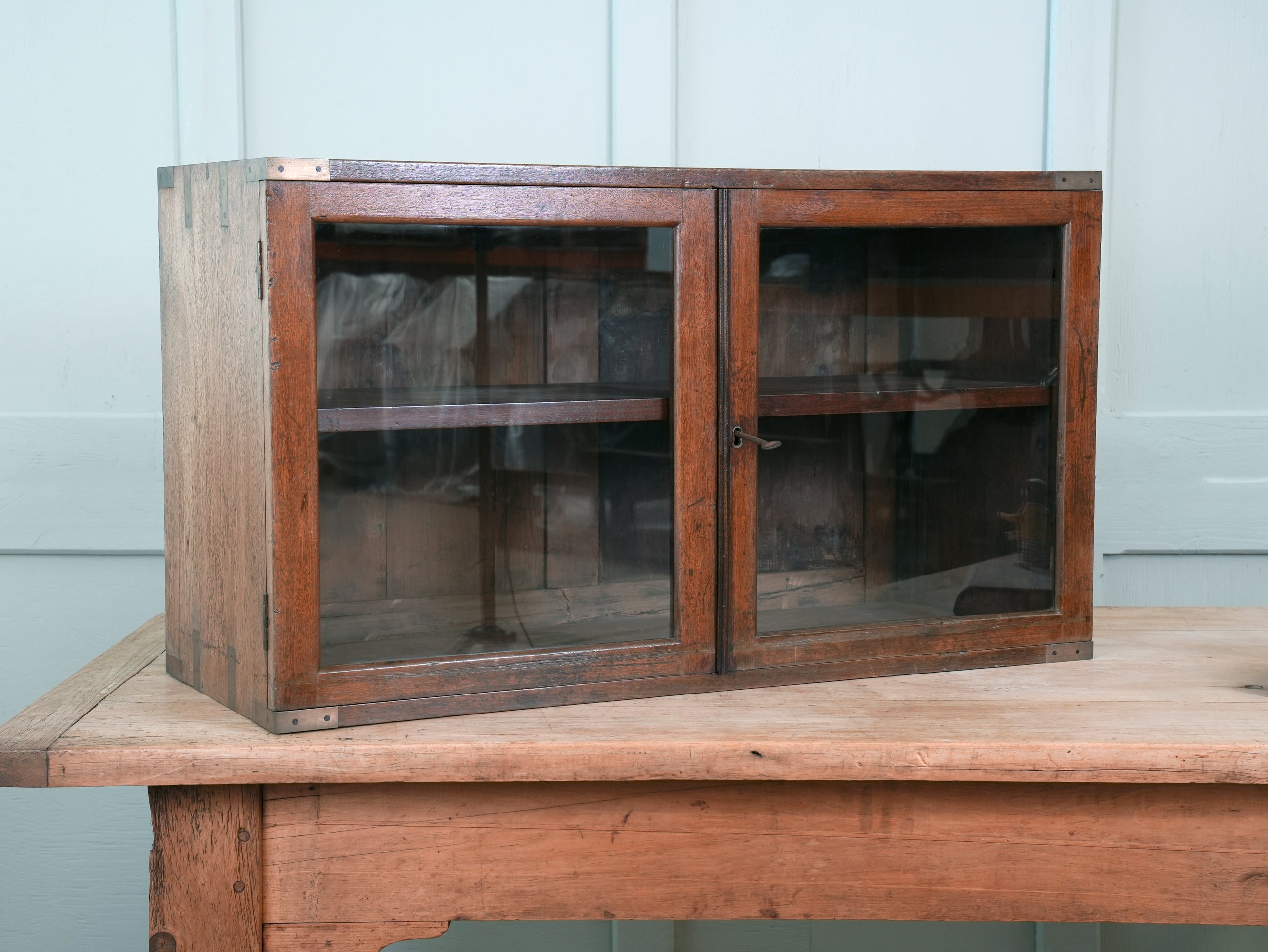 A 19th Century Glazed Campaign Cabinet