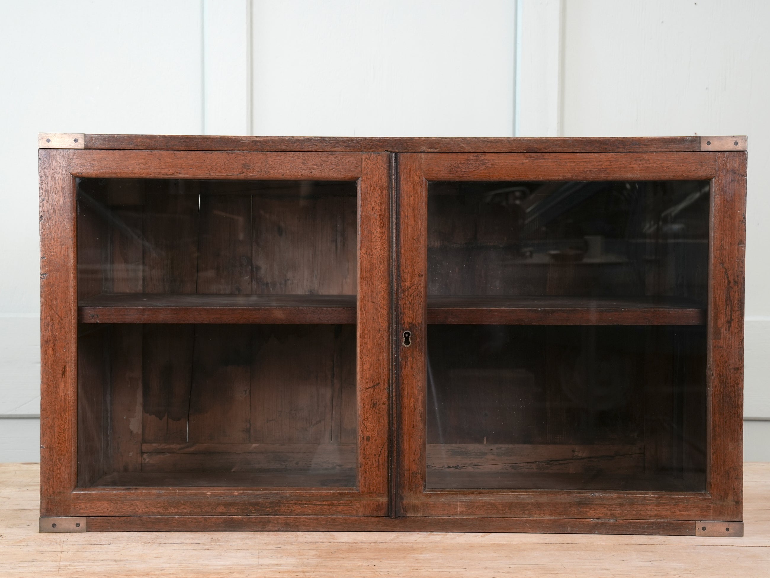 A 19th Century Glazed Campaign Cabinet