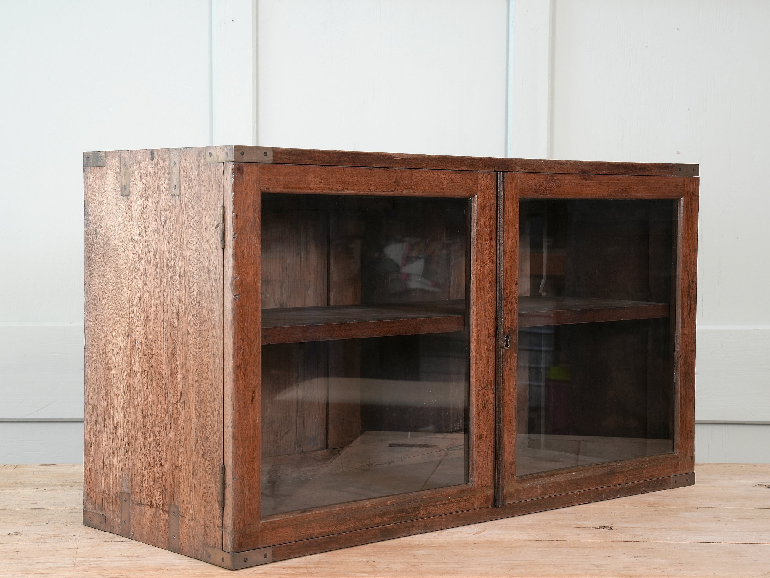 A 19th Century Glazed Campaign Cabinet