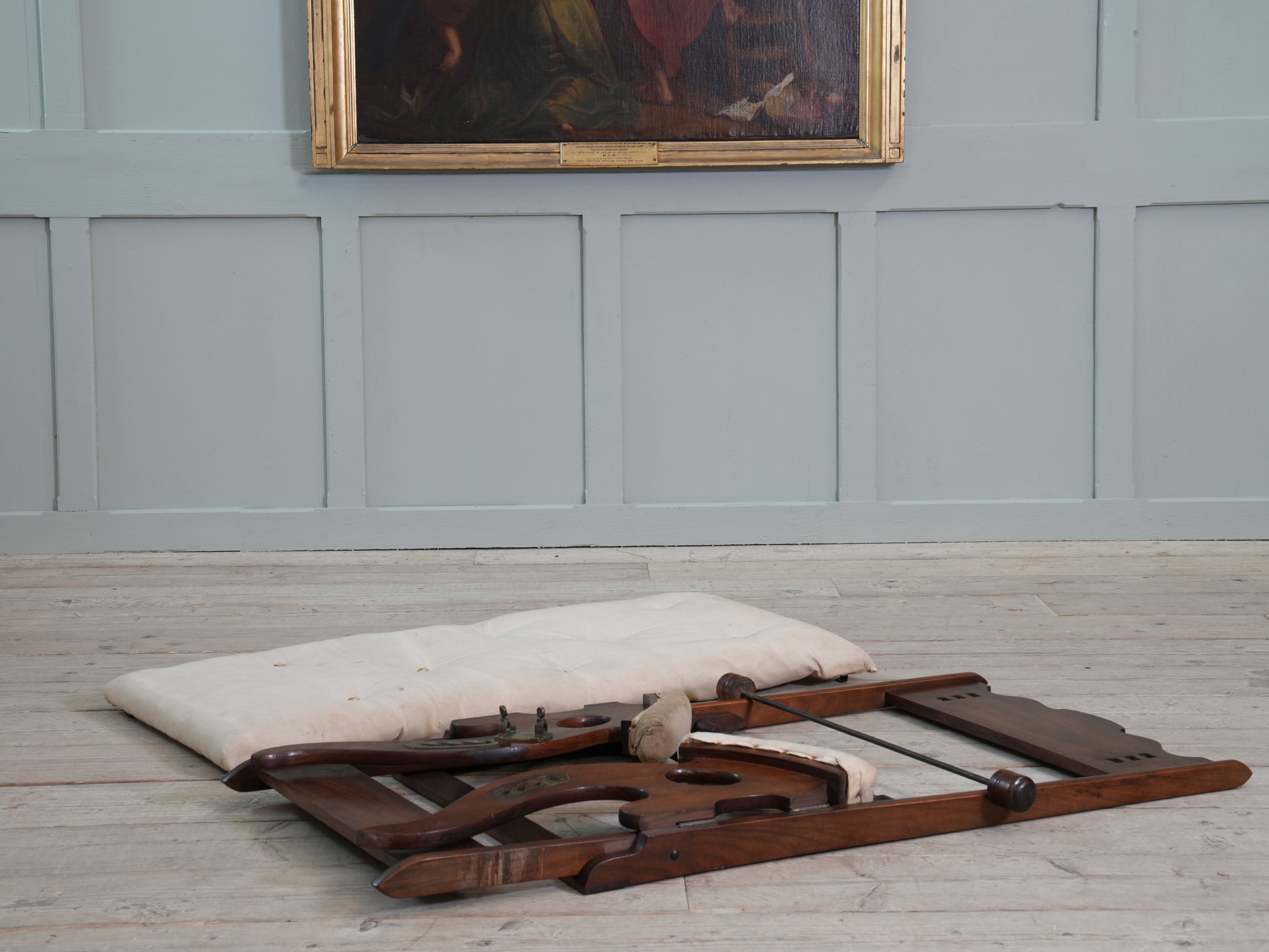 A Teak Campaign Chair