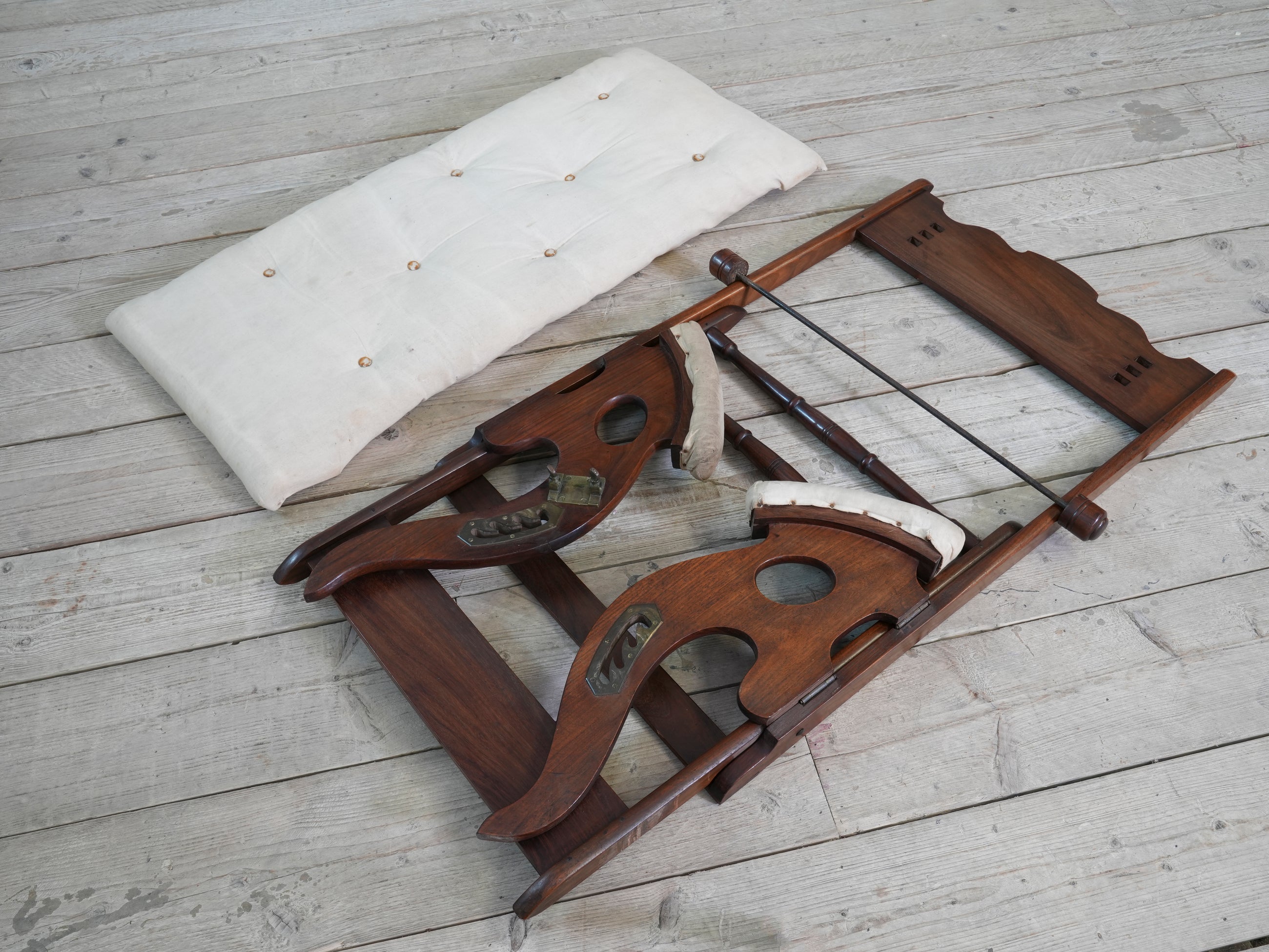 A Teak Campaign Chair