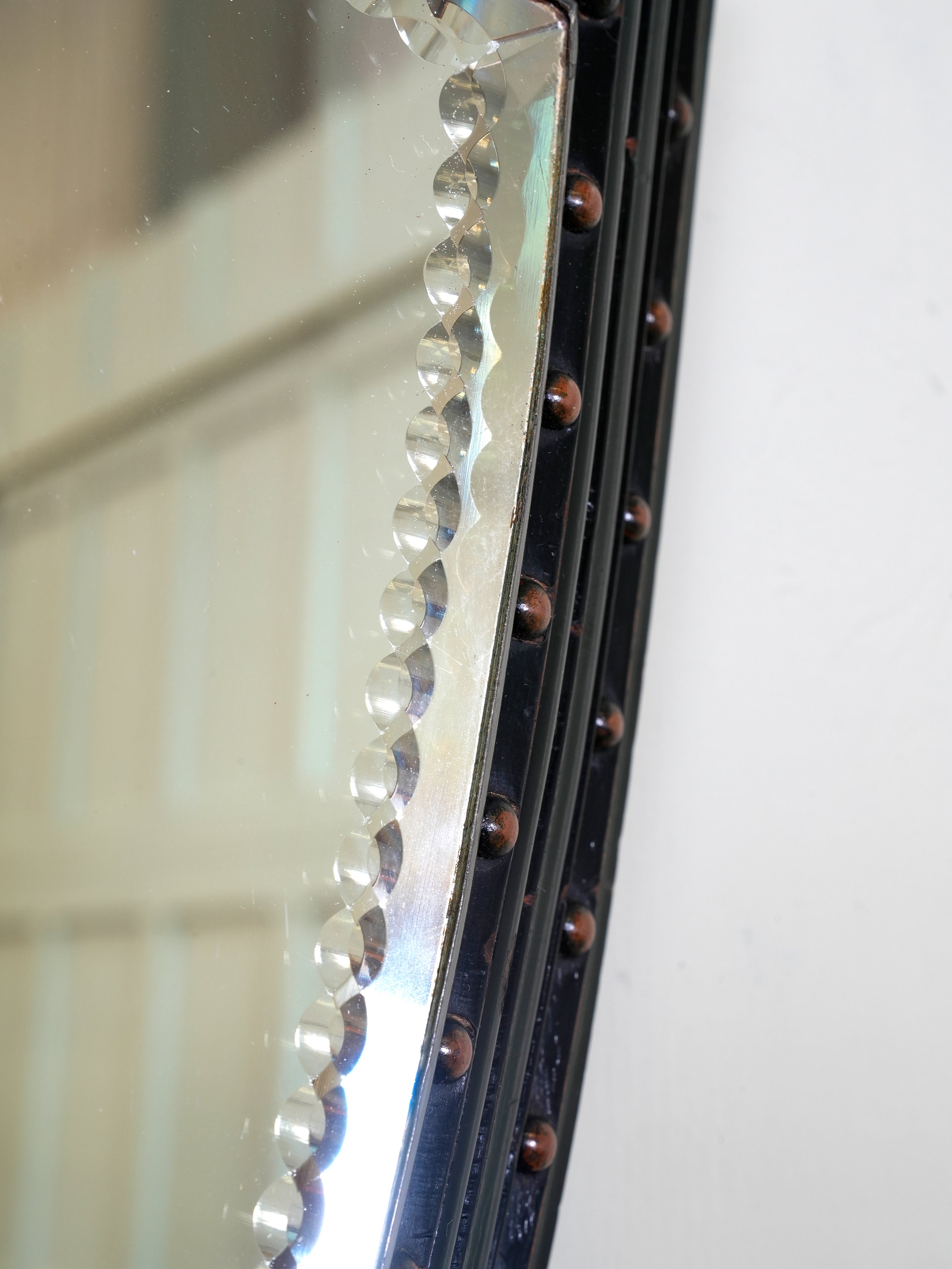 An Ebonised & Brilliant Cut Shield Mirror
