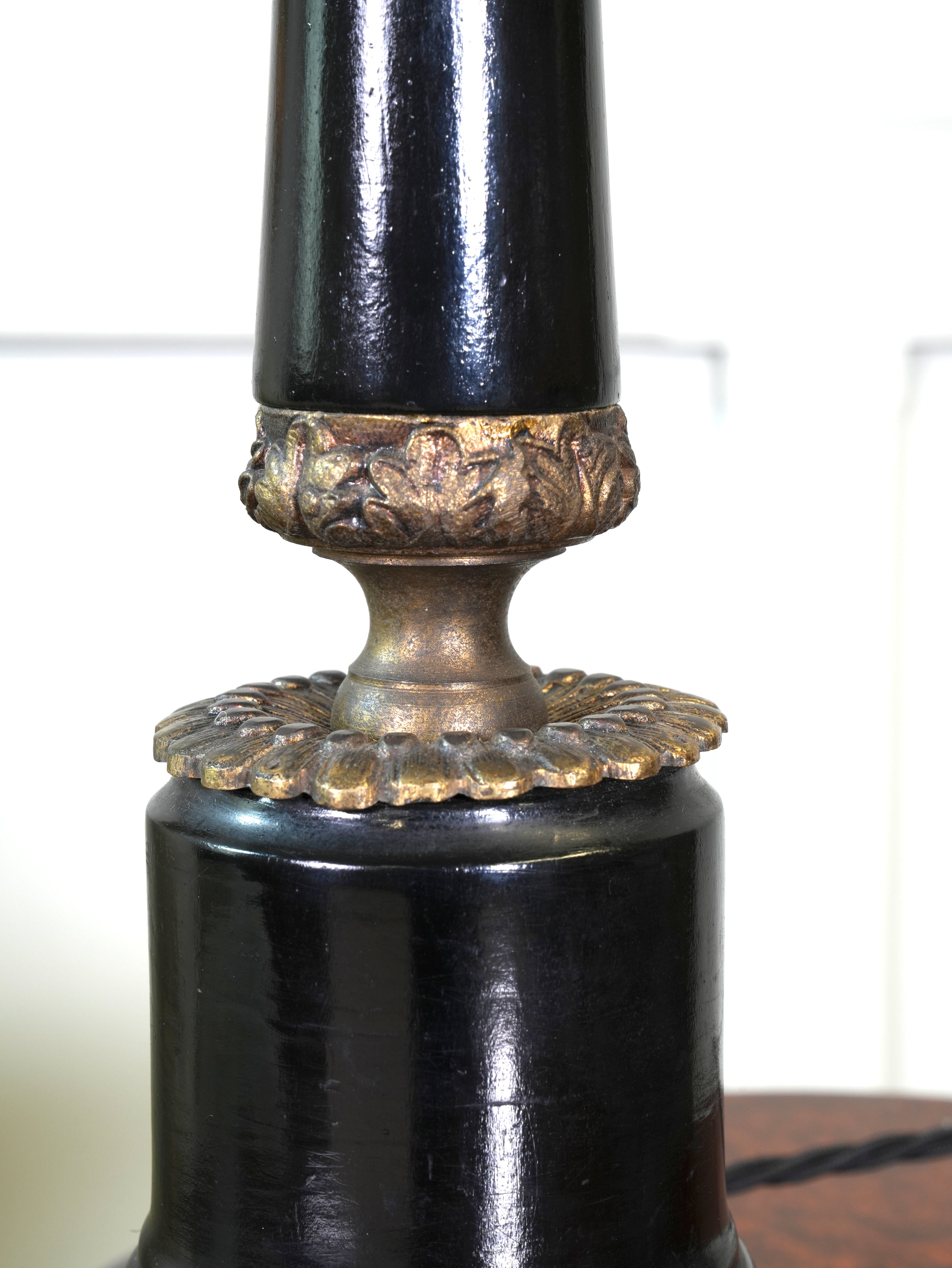 An Ebonised Timber Table Lamp
