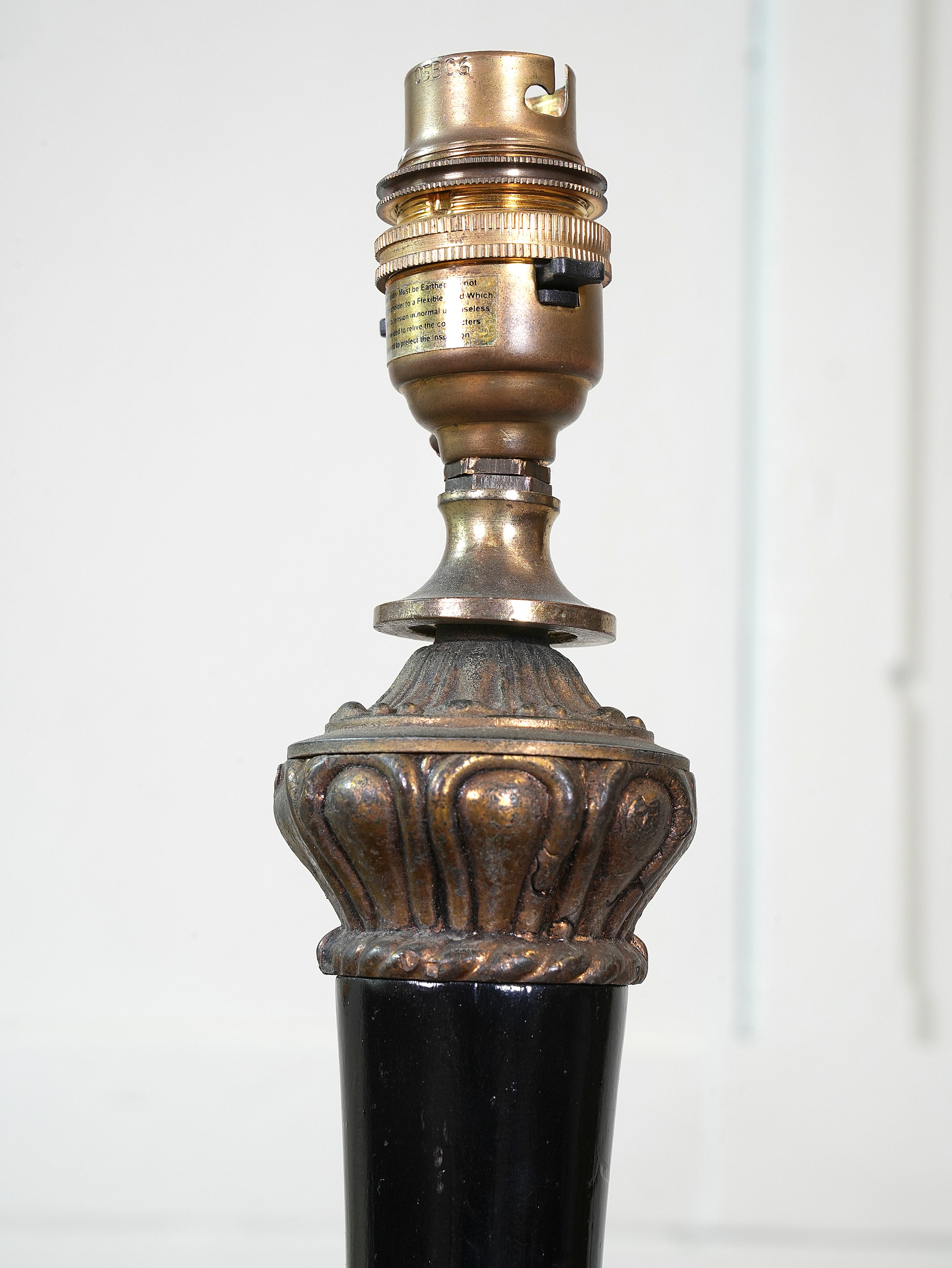 An Ebonised Timber Table Lamp
