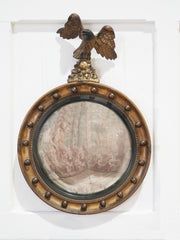 A Small Regency Convex Giltwood Mirror