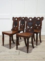 A Set of Four Regency Shield Back Oak Hall Chairs