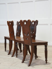 A Set of Four Regency Shield Back Oak Hall Chairs