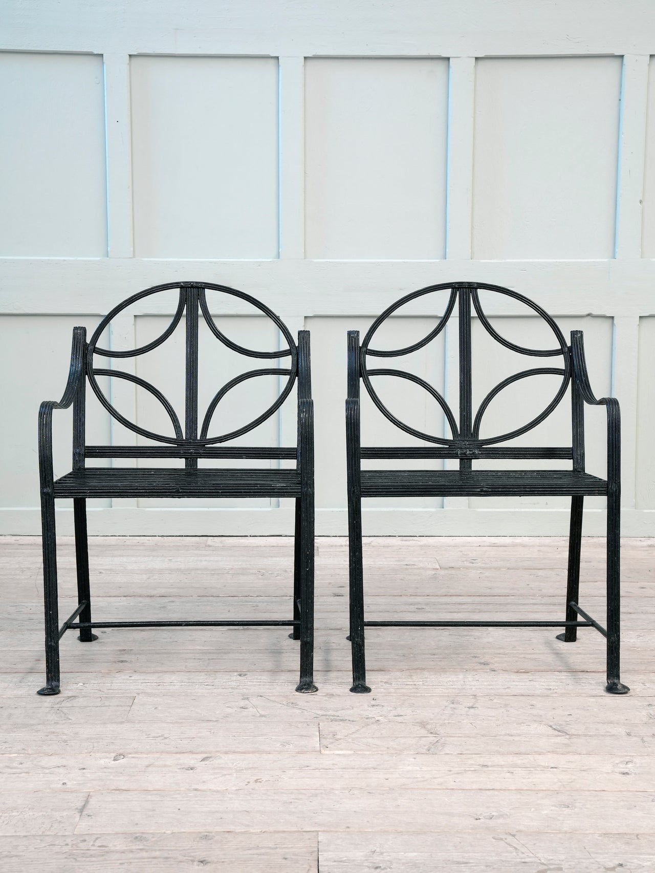 A Pair of Regency Wrought Iron Garden Chairs