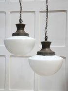A Pair of Large Opaline Glass Pendant Lights