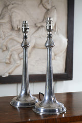 A Pair of Silvered Table Lamps