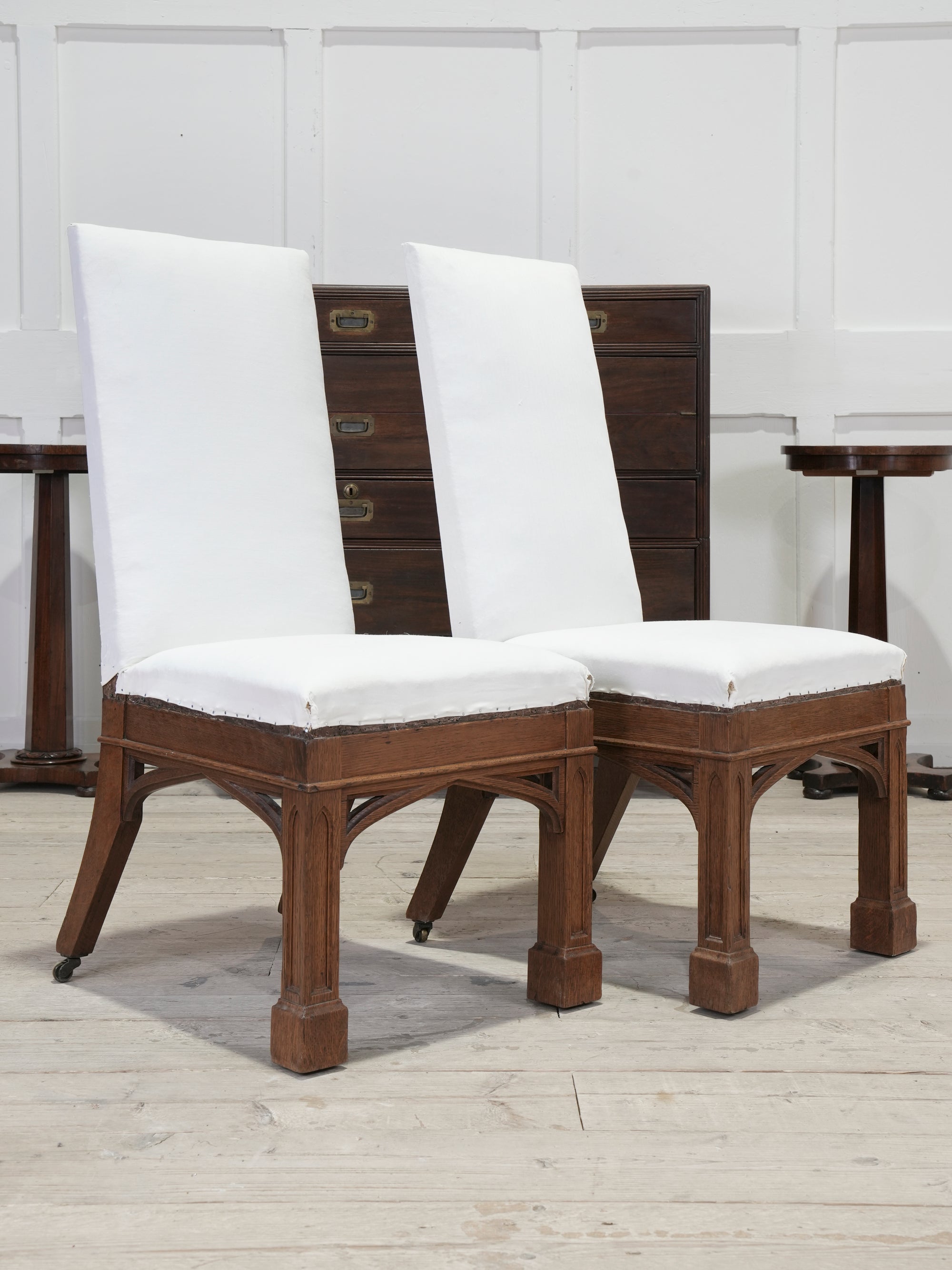 A Pair of Oak Side Chairs in the manner of Owen Jones