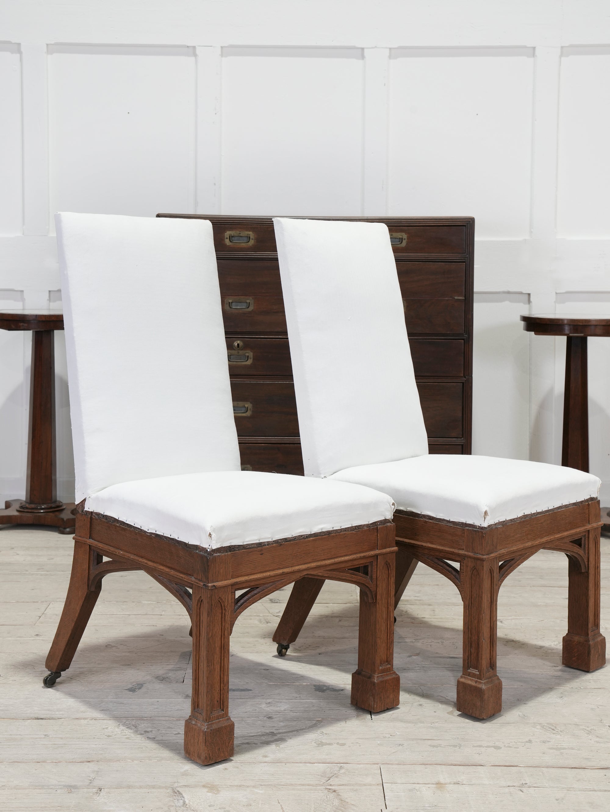 A Pair of Oak Side Chairs in the manner of Owen Jones