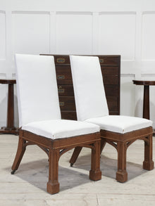 A Pair of Oak Side Chairs in the manner of Owen Jones