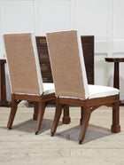 A Pair of Oak Side Chairs in the manner of Owen Jones