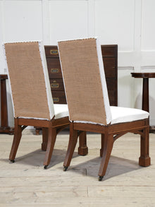 A Pair of Oak Side Chairs in the manner of Owen Jones