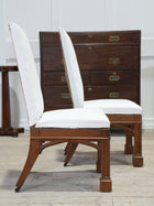 A Pair of Oak Side Chairs in the manner of Owen Jones