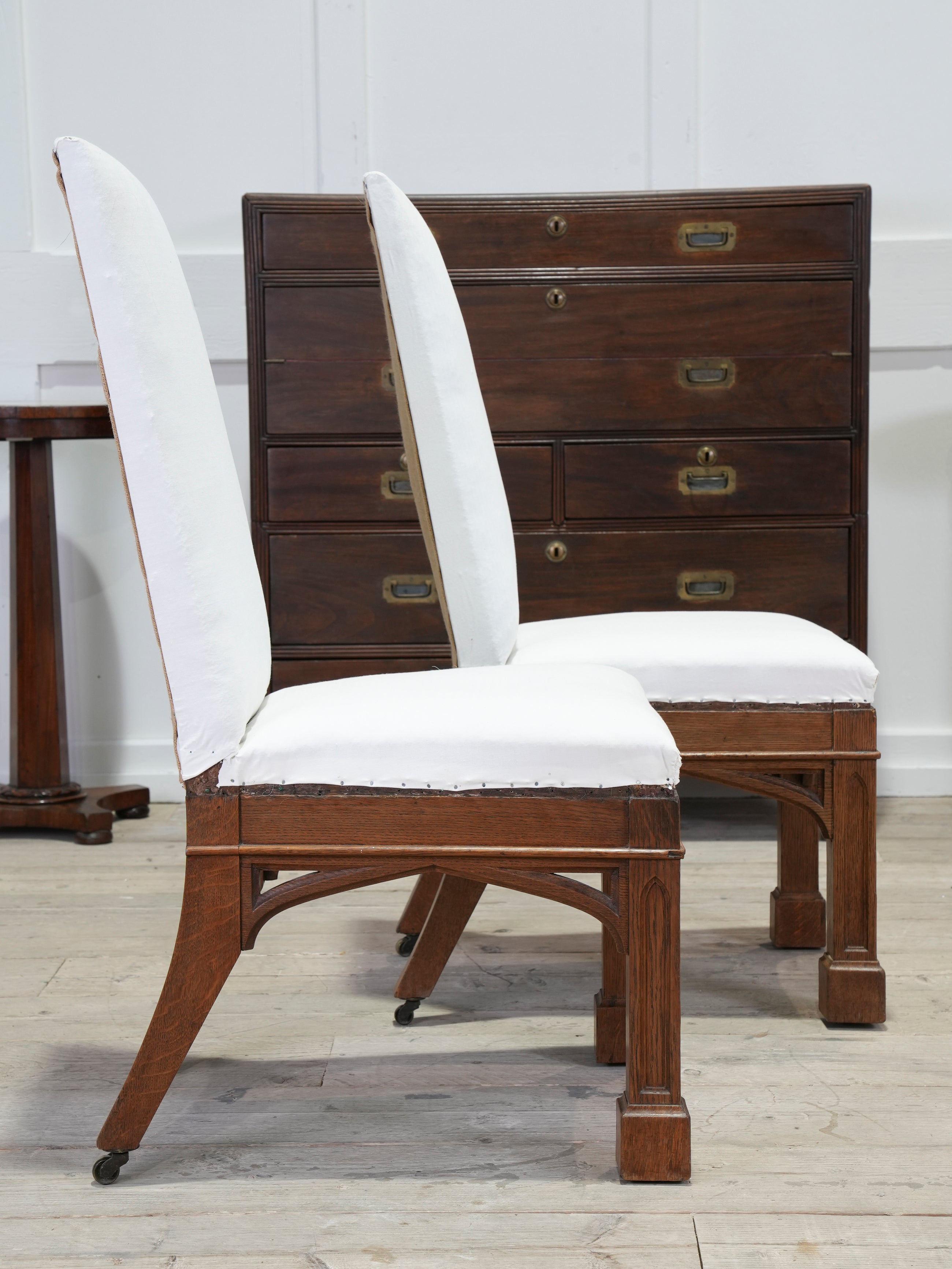 A Pair of Oak Side Chairs in the manner of Owen Jones