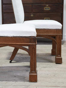 A Pair of Oak Side Chairs in the manner of Owen Jones