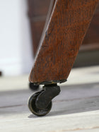 A Pair of Oak Side Chairs in the manner of Owen Jones