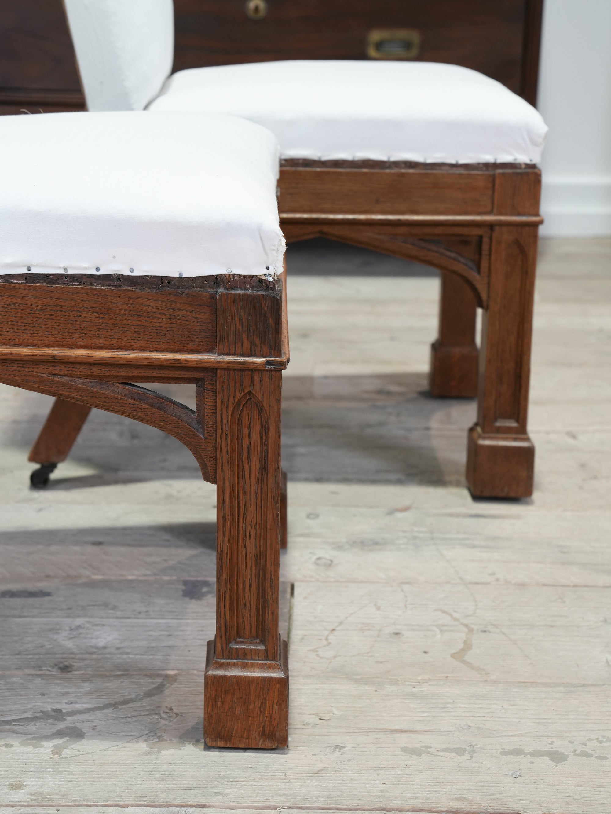 A Pair of Oak Side Chairs in the manner of Owen Jones