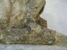 An 18th Century Limestone Putti on a Caen Stone Pillar