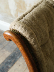 A 19th Century Upholstered Oak Armchair.