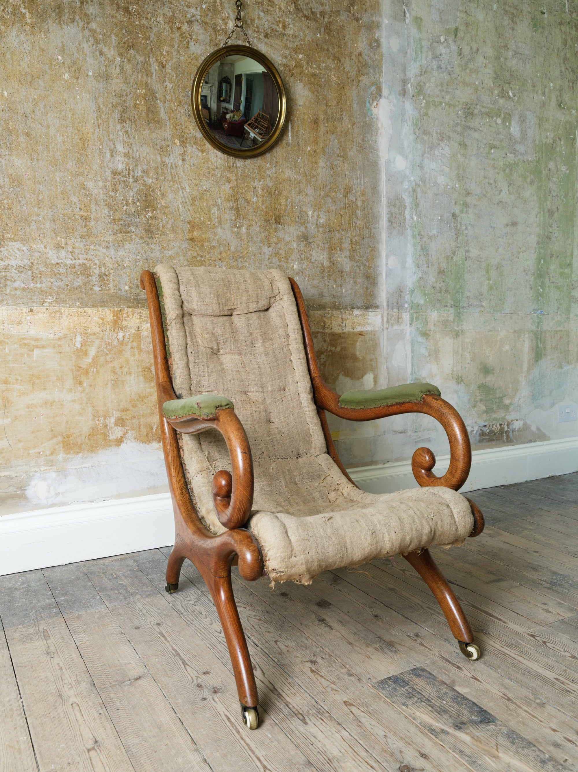 A 19th Century Upholstered Oak Armchair.