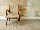 A 19th Century Upholstered Oak Armchair.