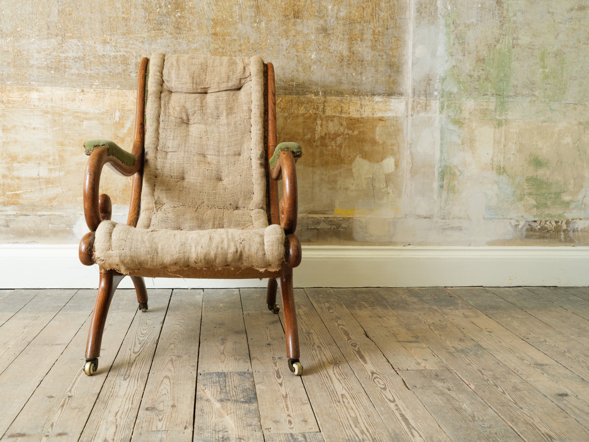 A 19th Century Upholstered Oak Armchair.