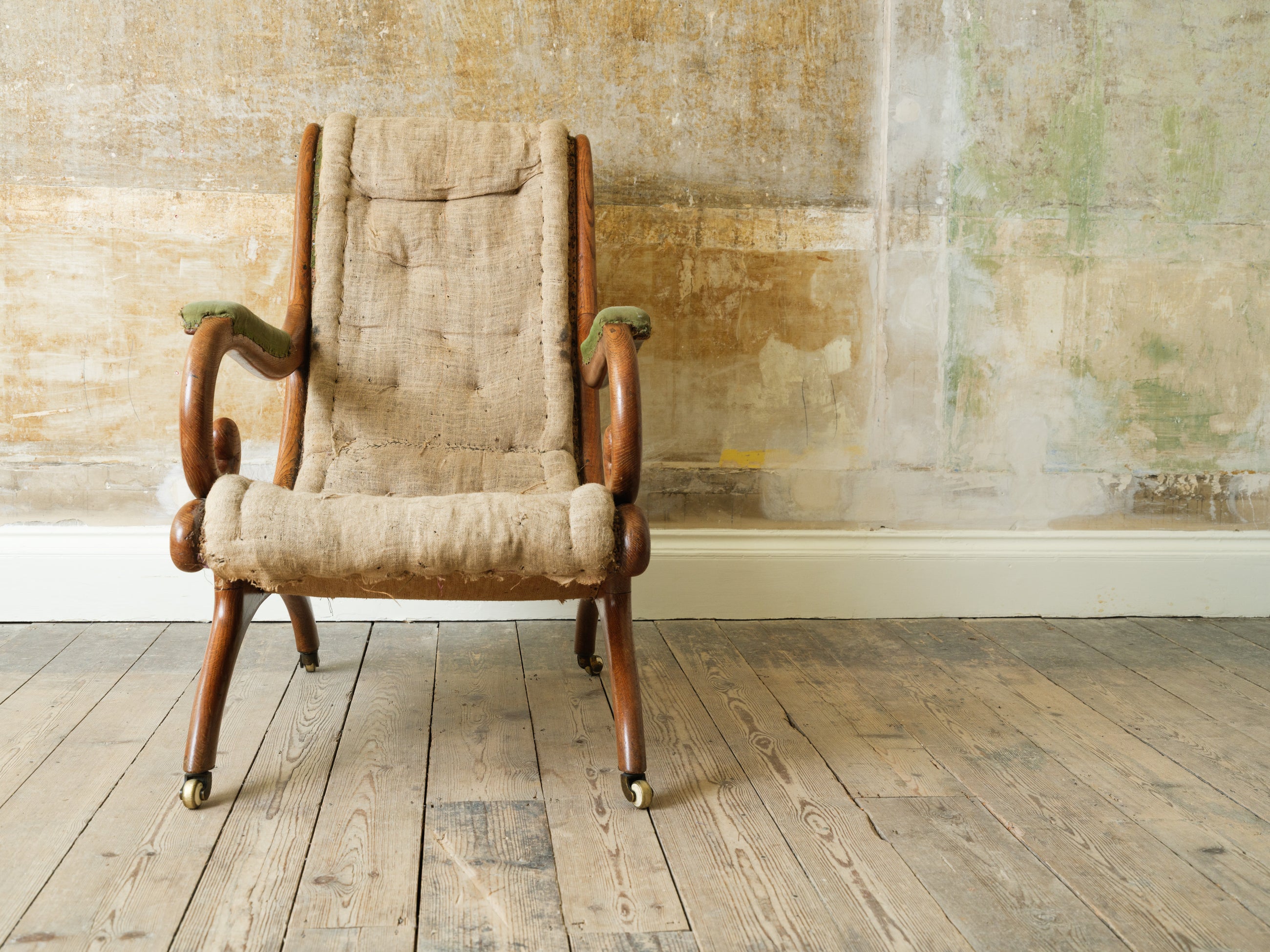 A 19th Century Upholstered Oak Armchair.