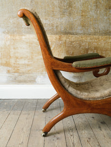 A 19th Century Upholstered Oak Armchair.