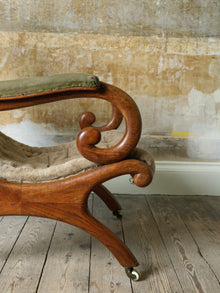 A 19th Century Upholstered Oak Armchair.