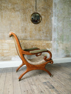 A 19th Century Upholstered Oak Armchair.