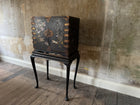 A Late 17th Century Japanese Export Cabinet on 18th Century English Stand