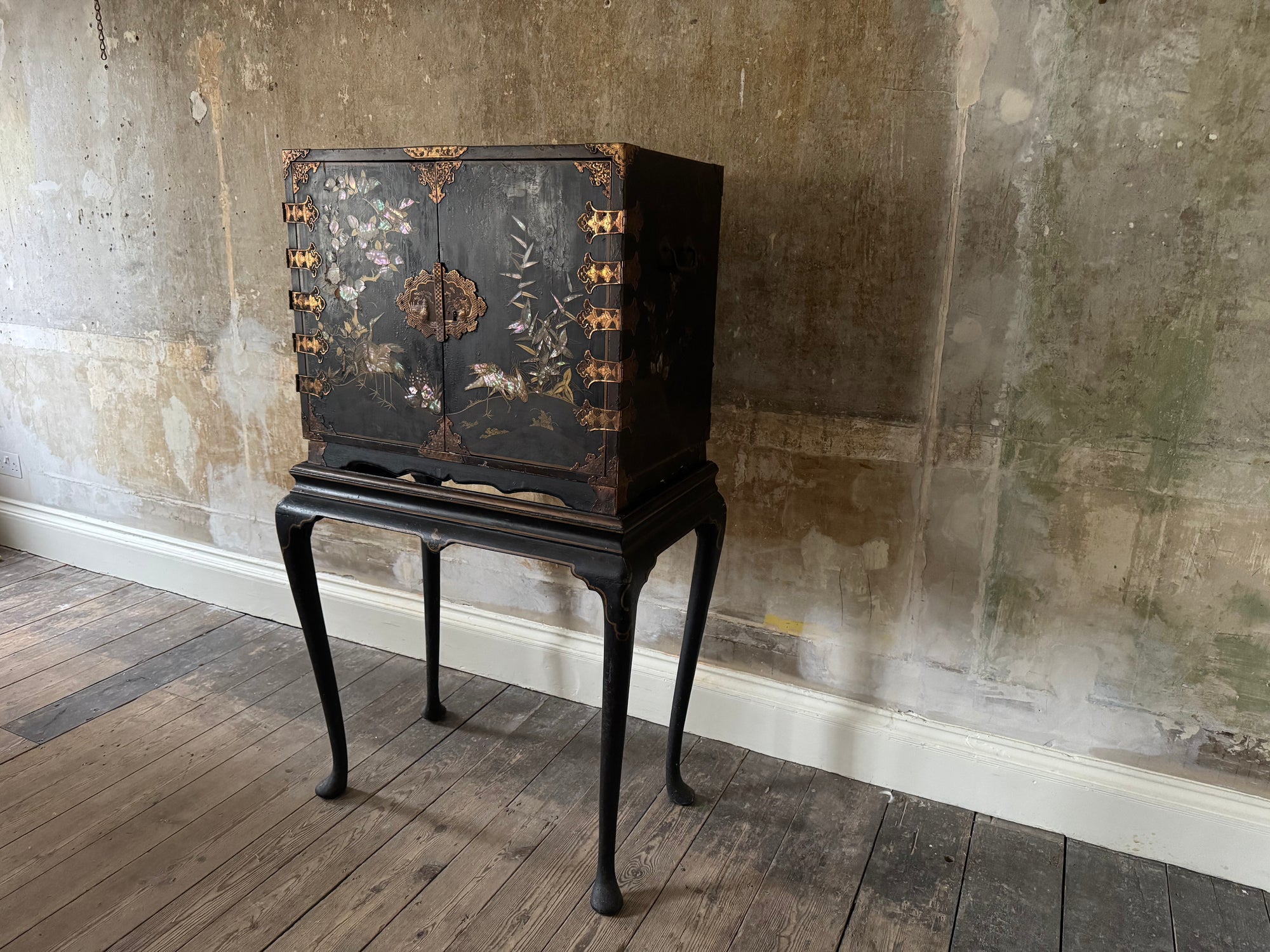 A Late 17th Century Japanese Export Cabinet on 18th Century English Stand