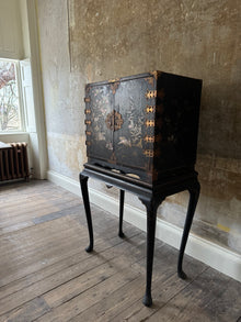 A Late 17th Century Japanese Export Cabinet on 18th Century English Stand