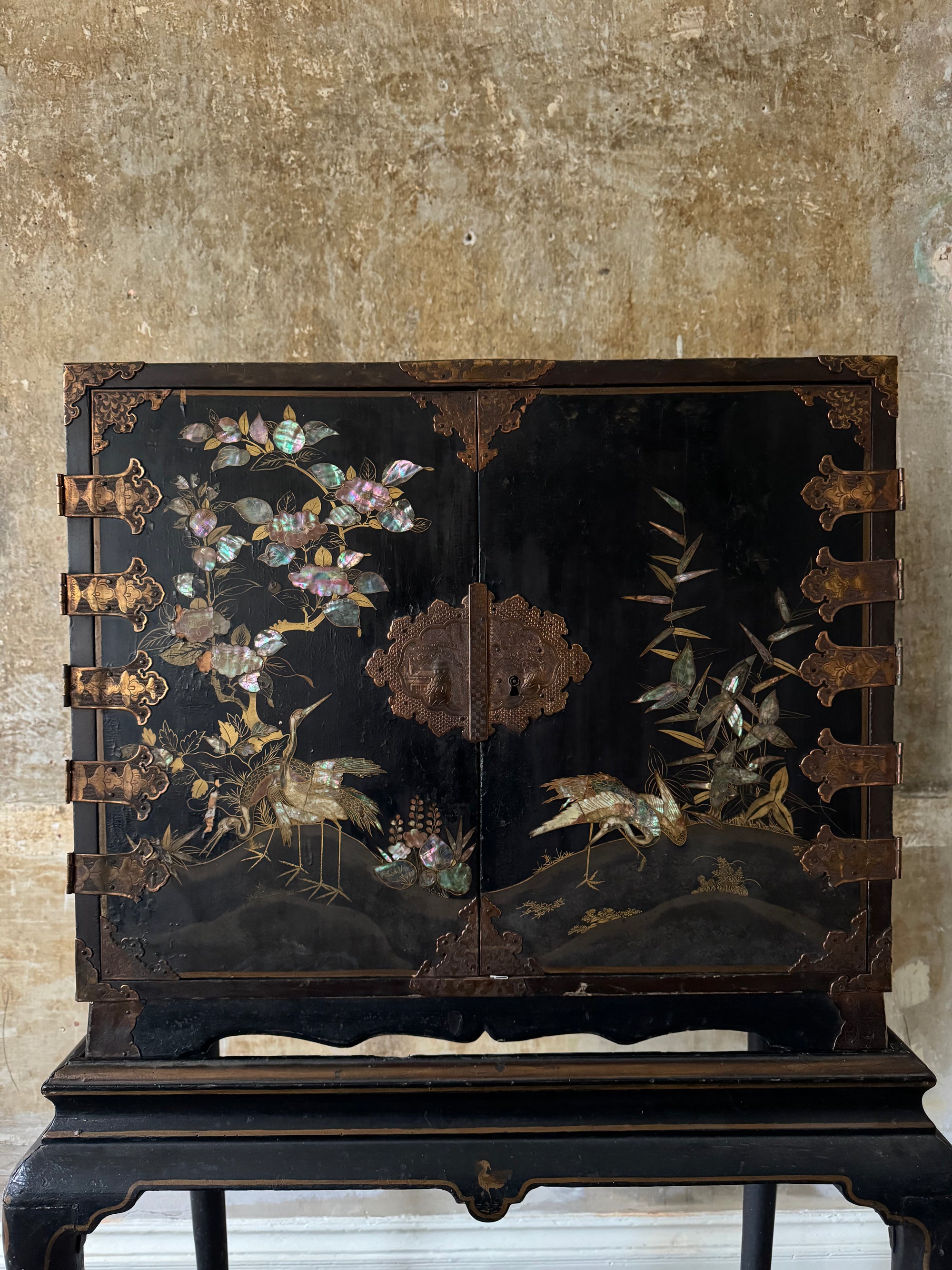 A Late 17th Century Japanese Export Cabinet on 18th Century English Stand