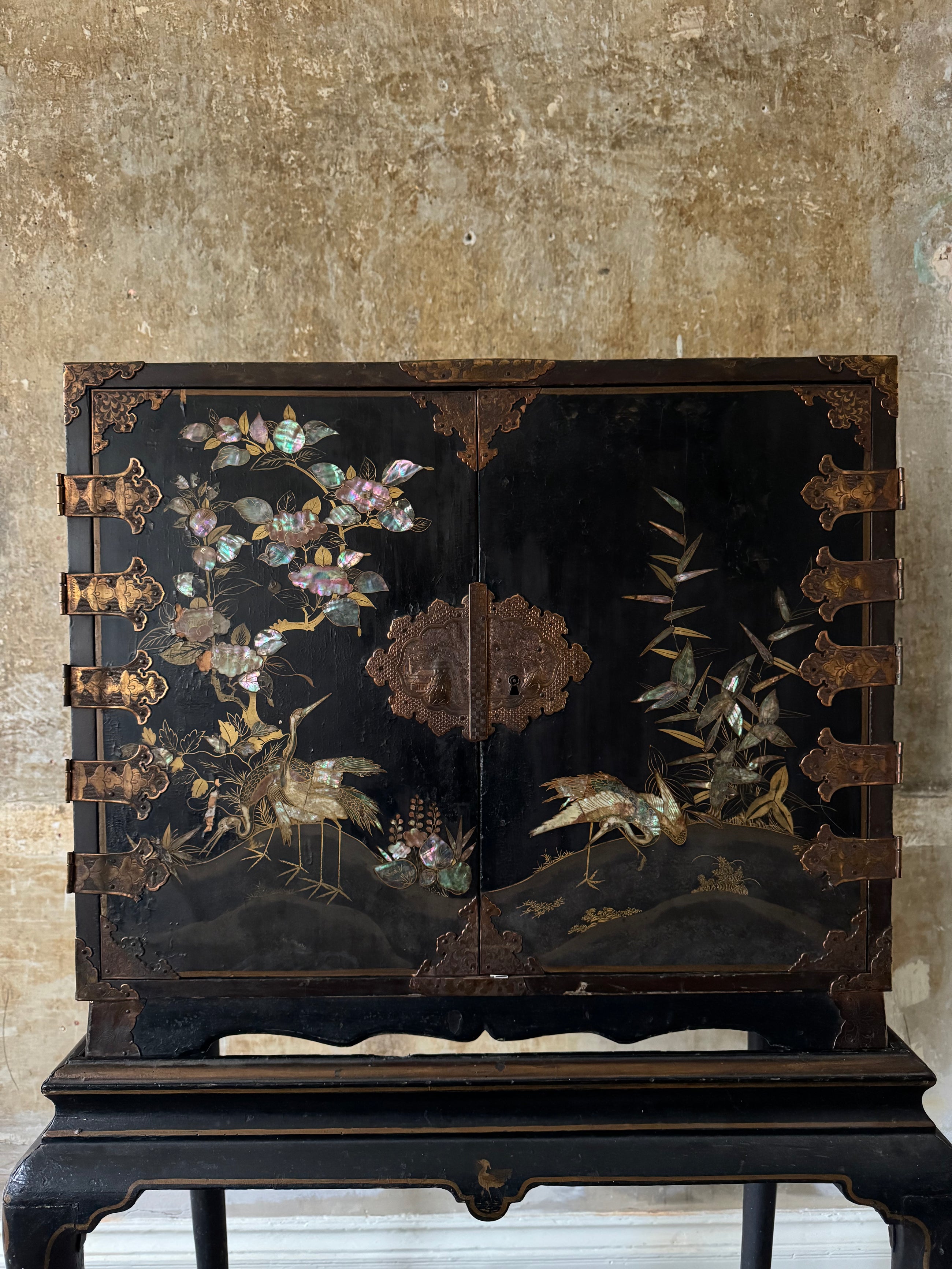 A Late 17th Century Japanese Export Cabinet on 18th Century English Stand