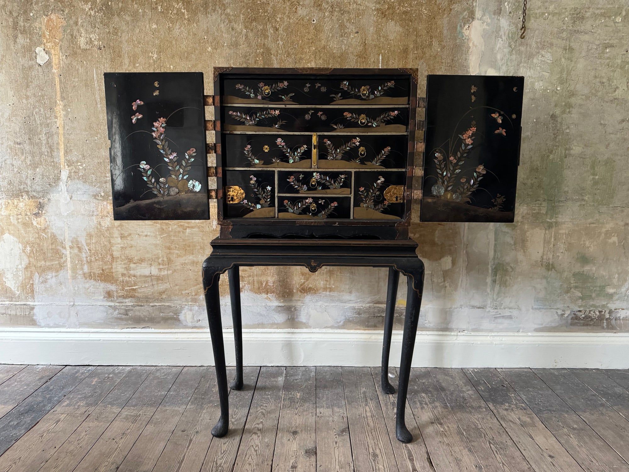 A Late 17th Century Japanese Export Cabinet on 18th Century English Stand