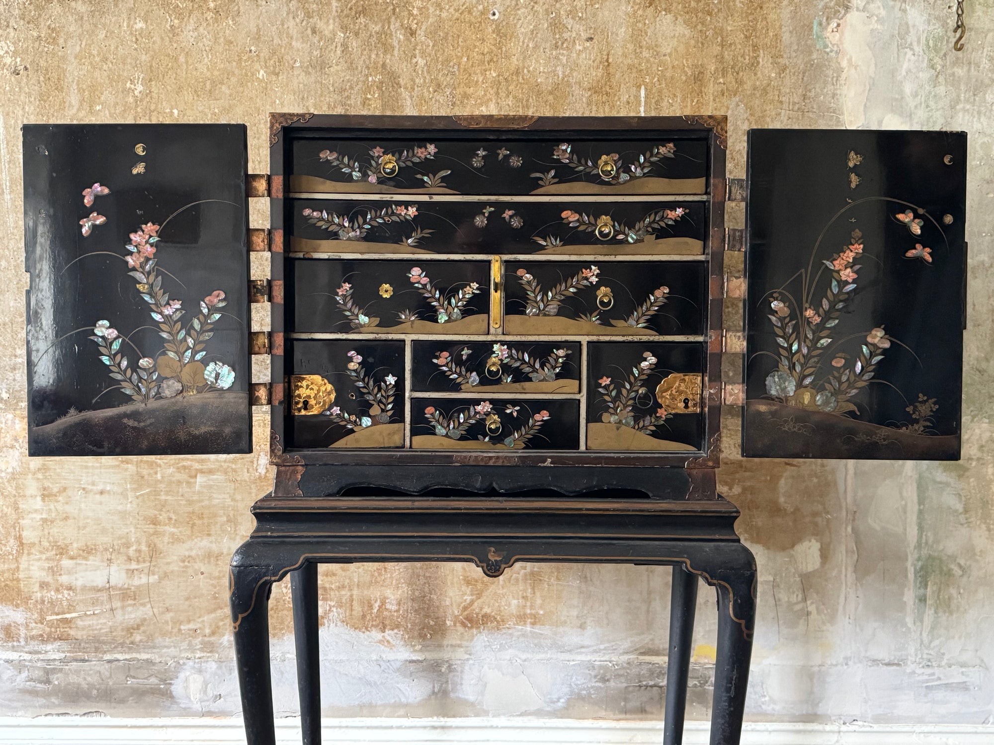 A Late 17th Century Japanese Export Cabinet on 18th Century English Stand