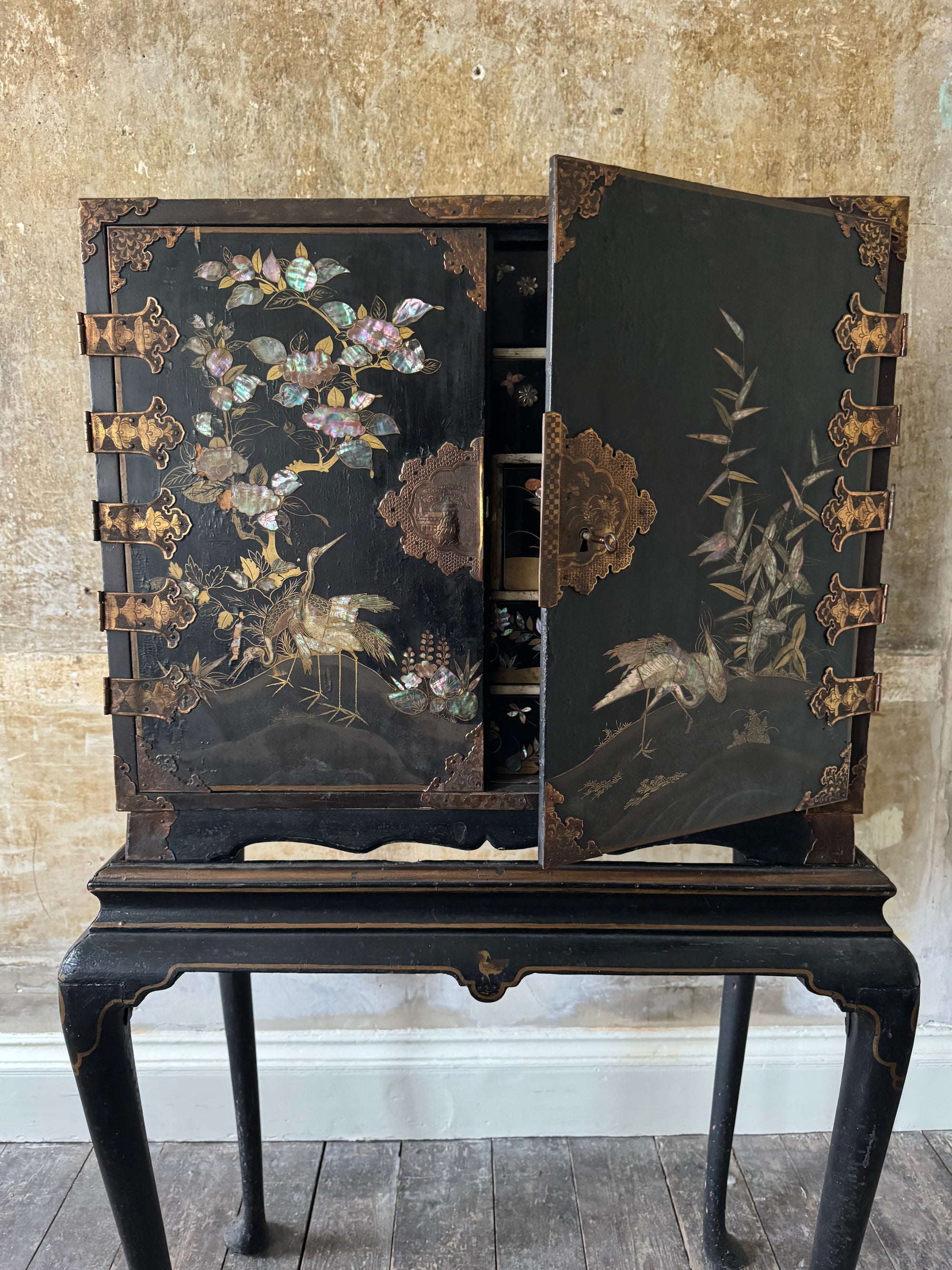 A Late 17th Century Japanese Export Cabinet on 18th Century English Stand