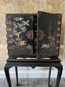 A Late 17th Century Japanese Export Cabinet on 18th Century English Stand