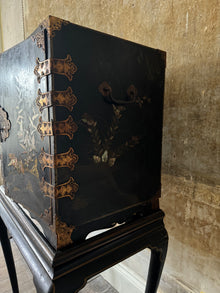 A Late 17th Century Japanese Export Cabinet on 18th Century English Stand